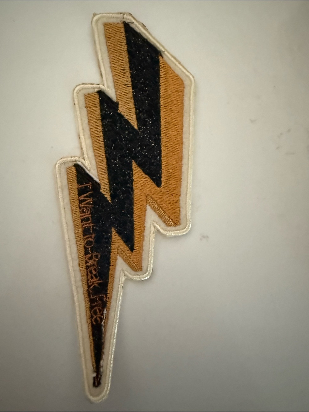 Nautilus Black and Gold Lightning Bolt Patch